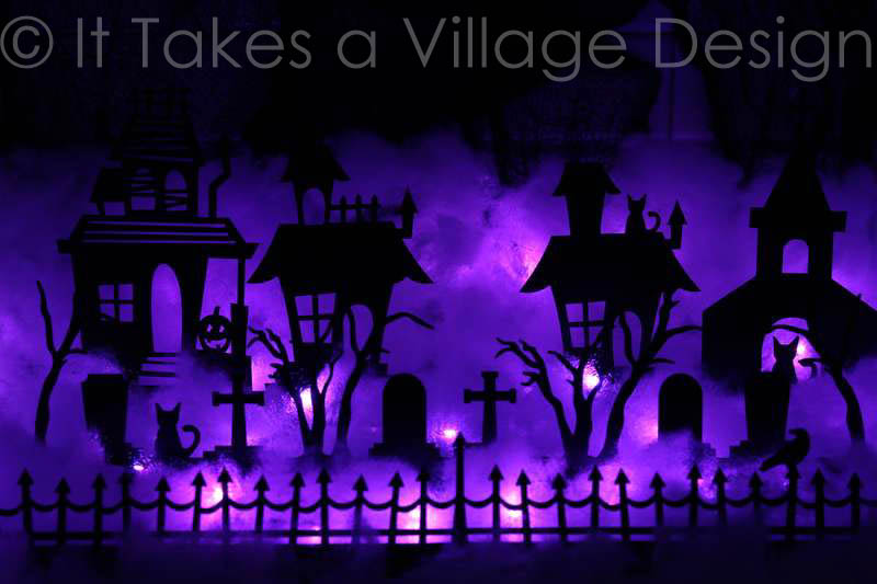 Cemetery Scene laser cut out of black mdf with purple lights